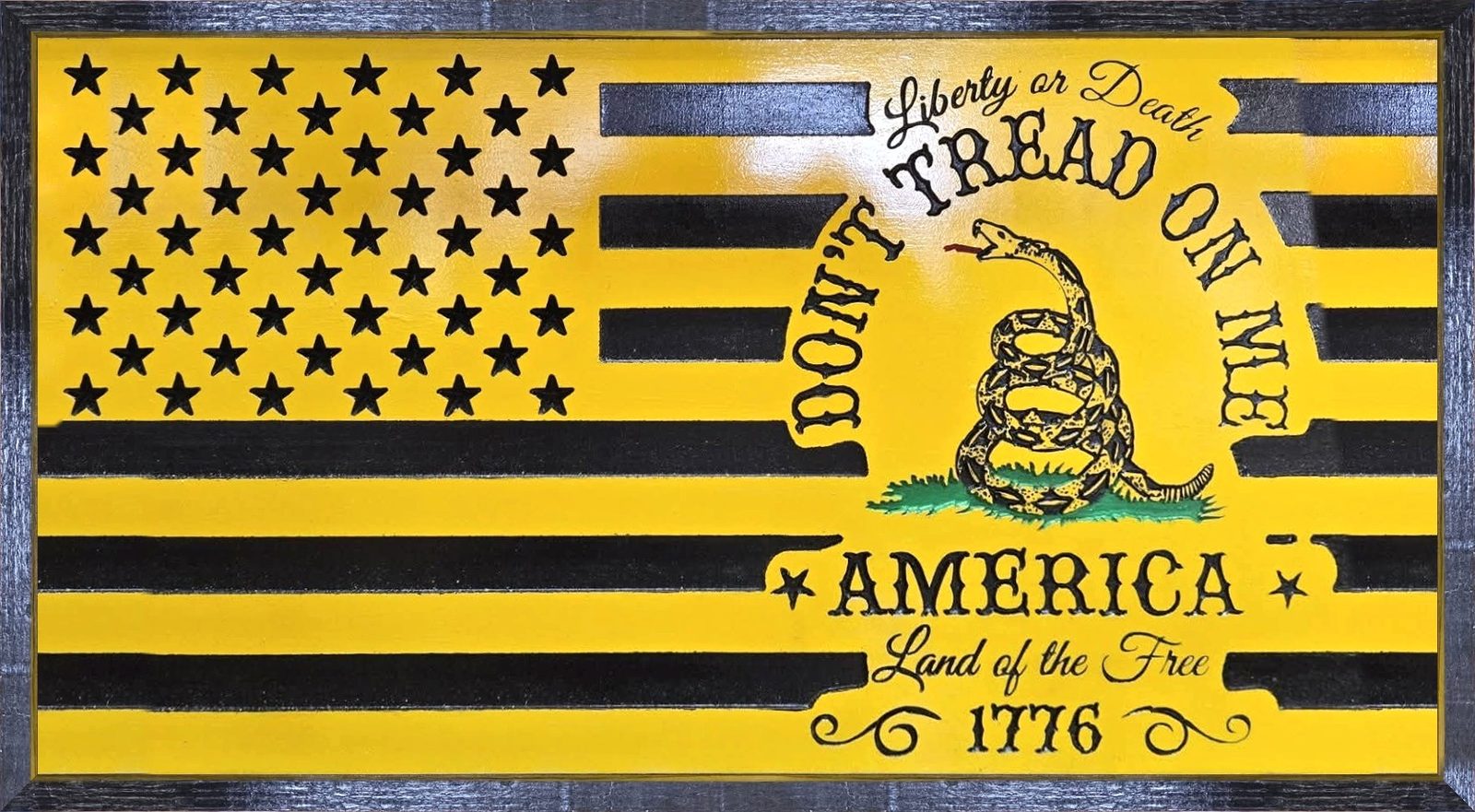 Yellow and black carved flag with a coiled snake, Dont Tread On Me, America, Land of the Free, 1776